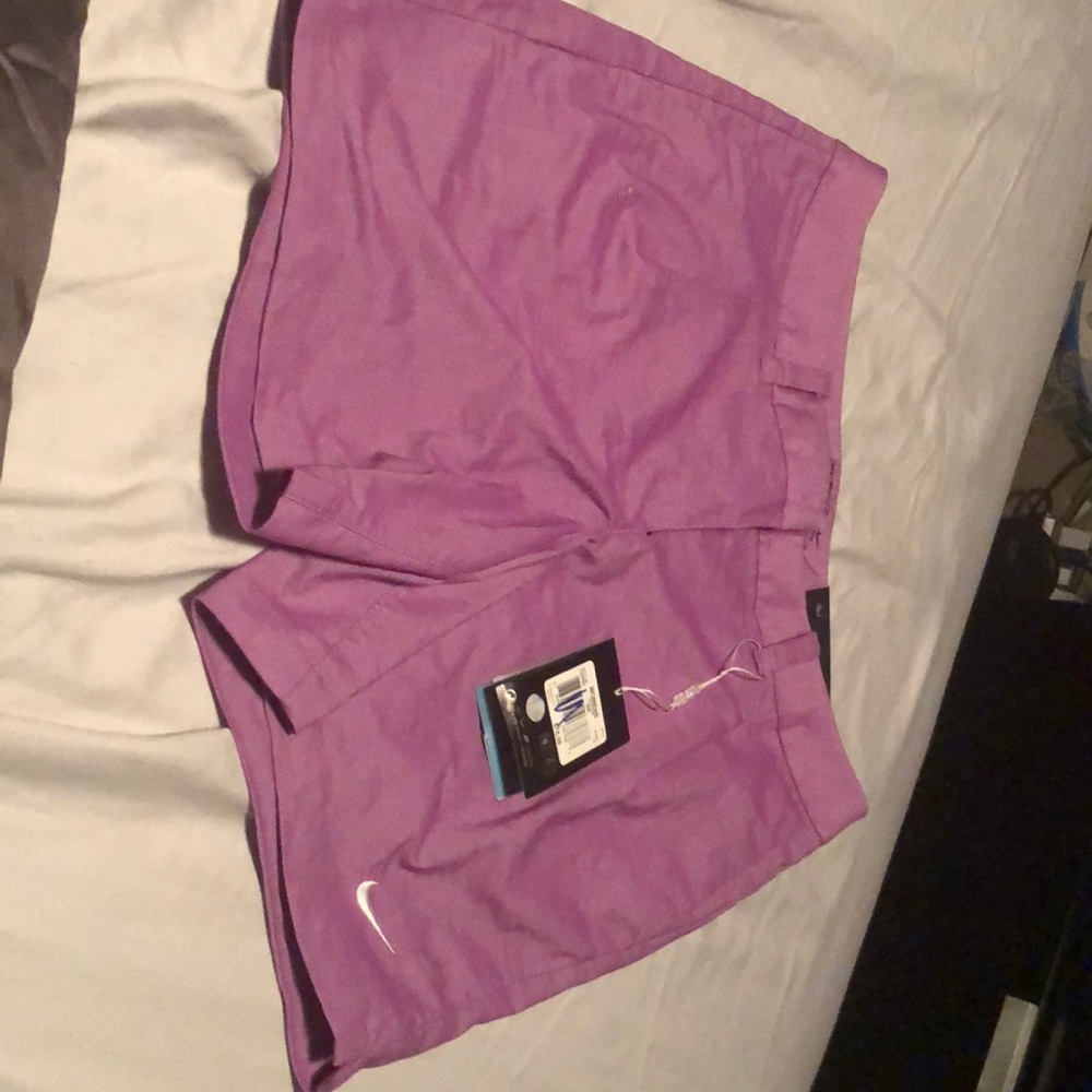 Nike gold did fit performance purple shorts